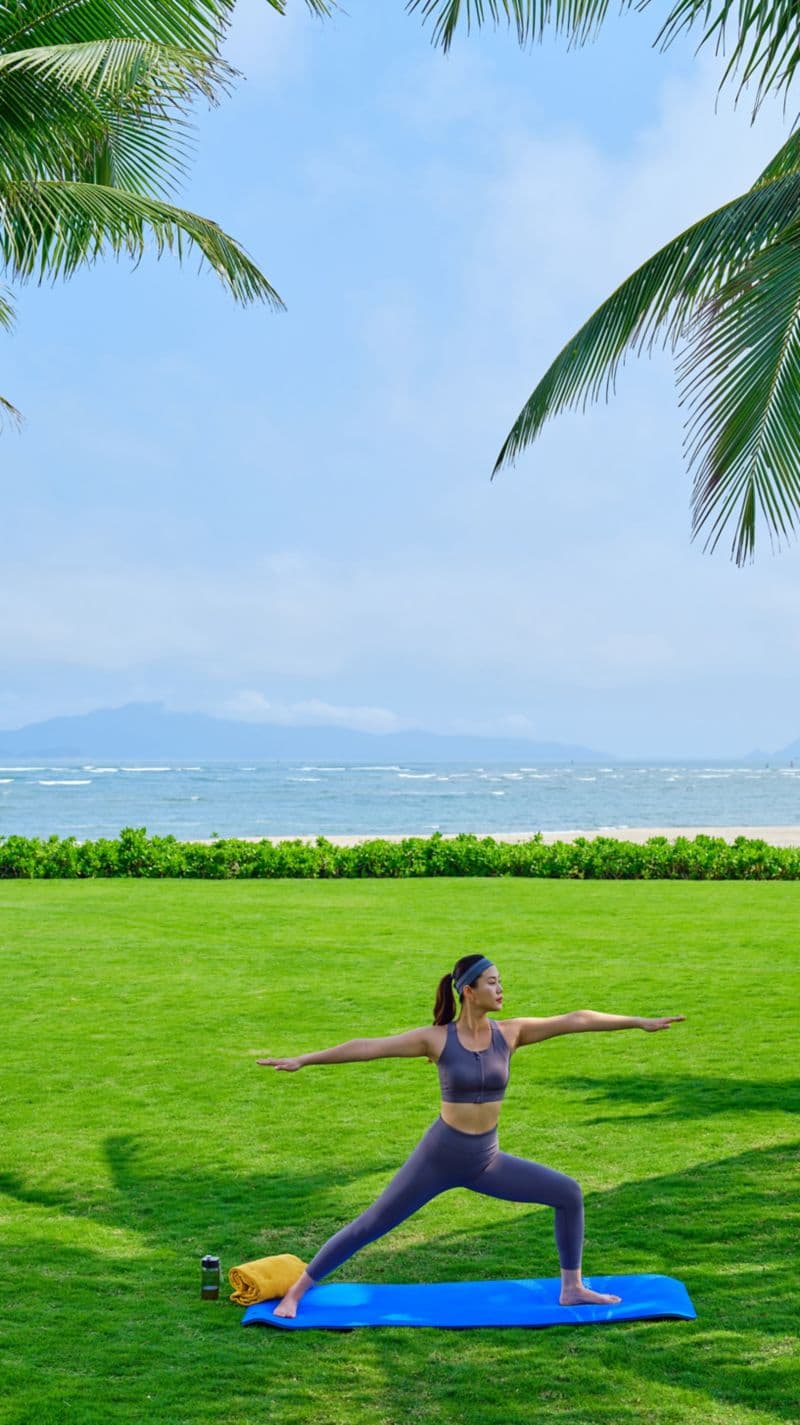 Morning class on the resort's beachfront lawn overlooking the sea