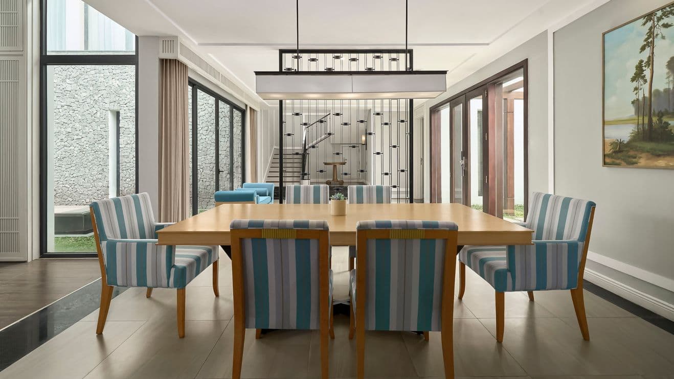 Villa dining room with seating for the whole crew